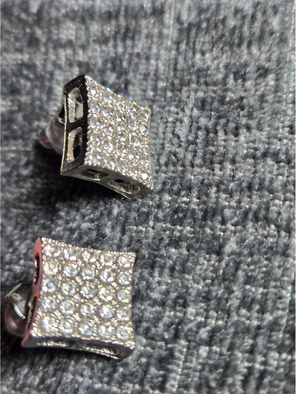 Beautiful half inch flared square studded earrings